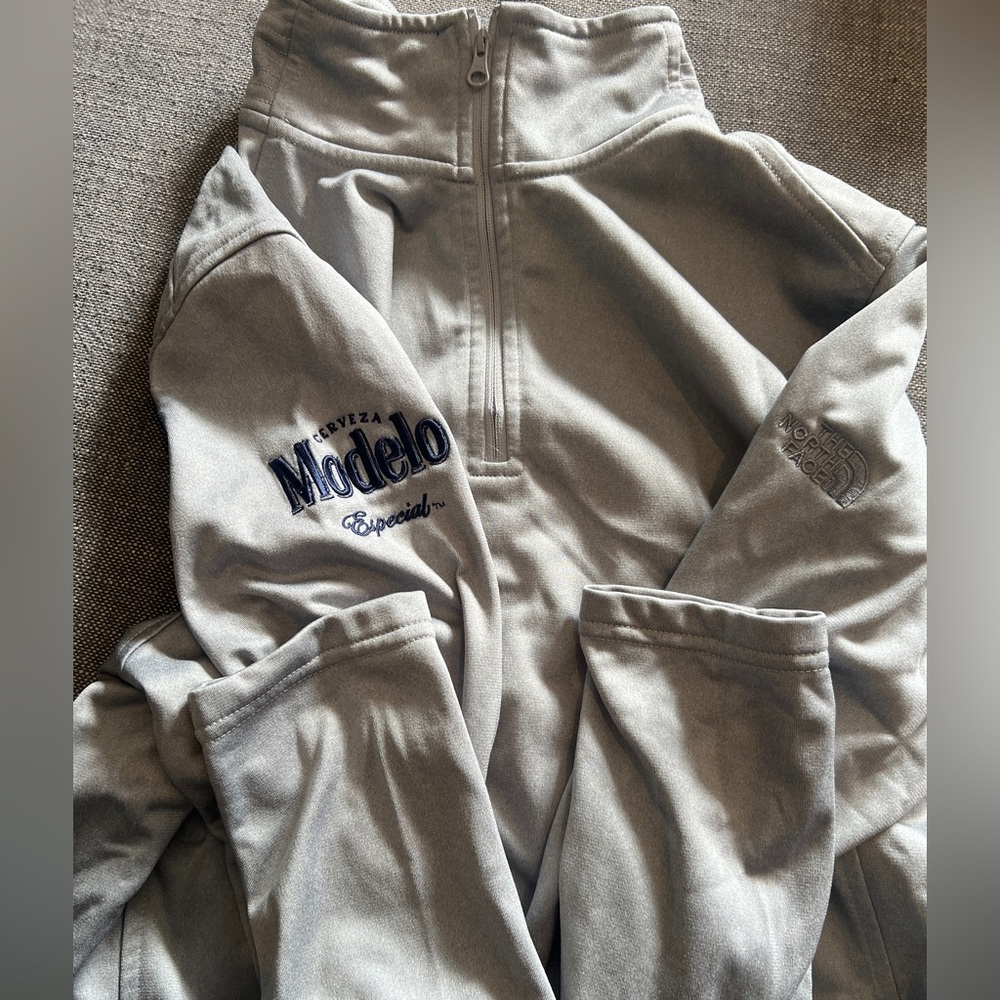 Women’s North Face & Modelo 1/4 zip grey top.